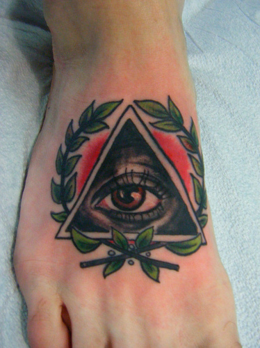 Very Nice Triangle Eye With Leaves Color Tattoo On Foot