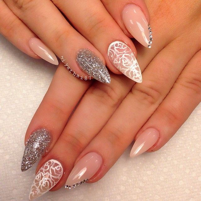 White Lace Flower Design And Silver Glitter Stiletto Nail Art