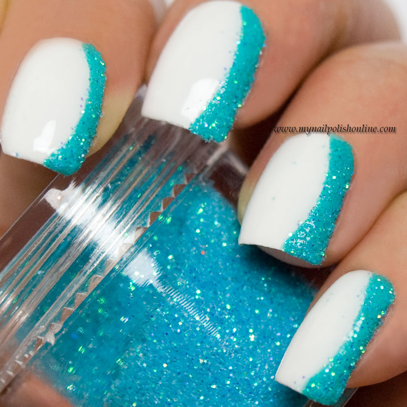 White Nails With Blue Glitter Nail Art