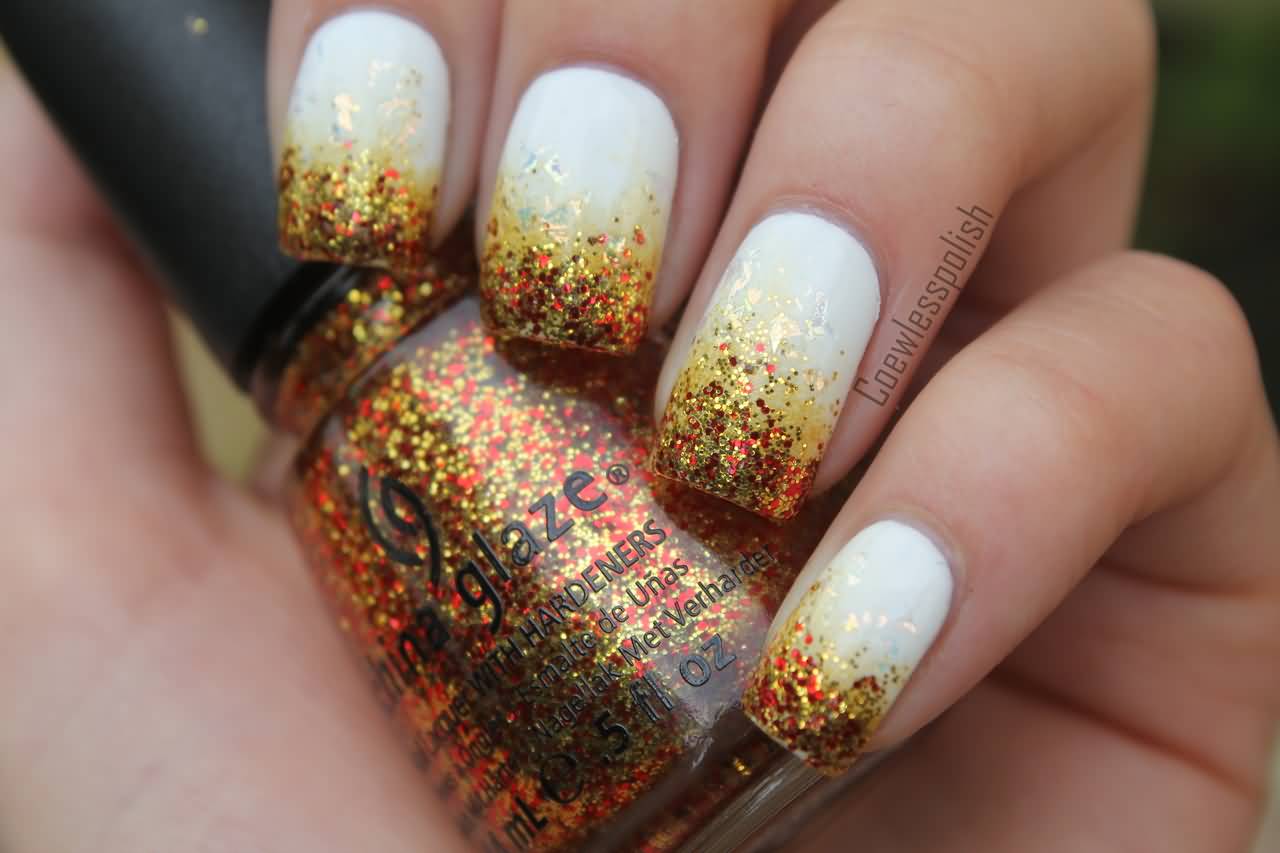 White Nails With Gold And Red Glitter Nail Art