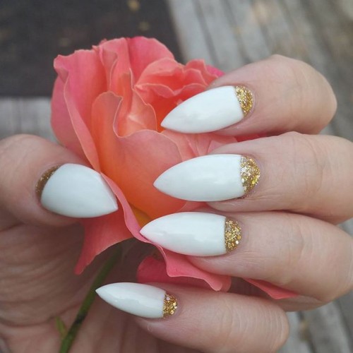 White Stiletto Nail Art With Gold Glitter Reverse French Tip Design Idea