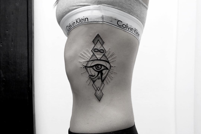 Wonderful Geometric Horus Eye Tattoo On Side Rib