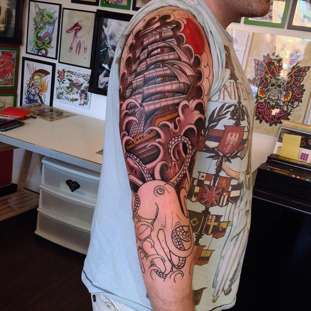 Wonderful Octopus And Seaship Tattoo On Arm For Men