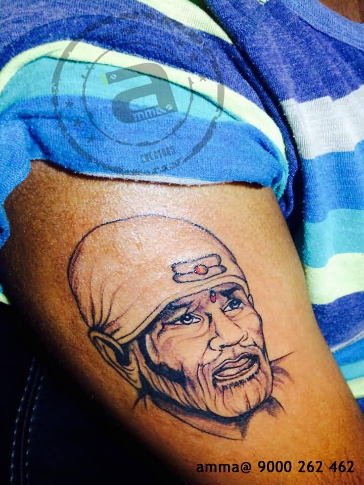 Wonderful Sai Baba Face Tattoo On Half Sleeve