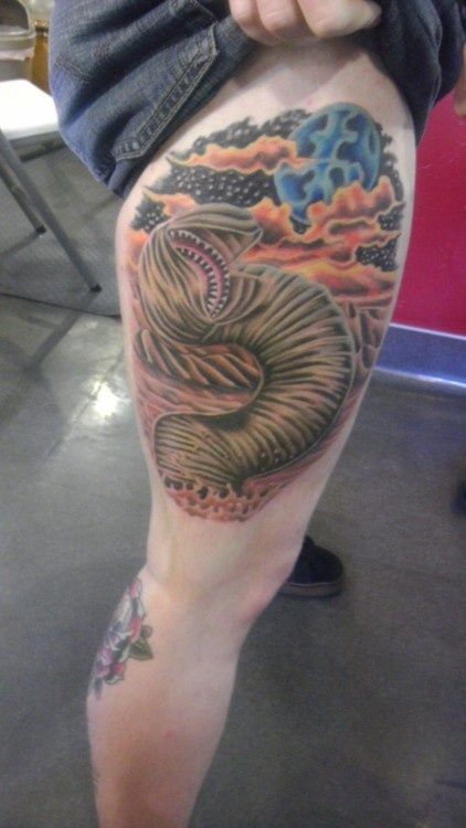 Wonderful Worm In Night View Color Tattoo On Right Thigh