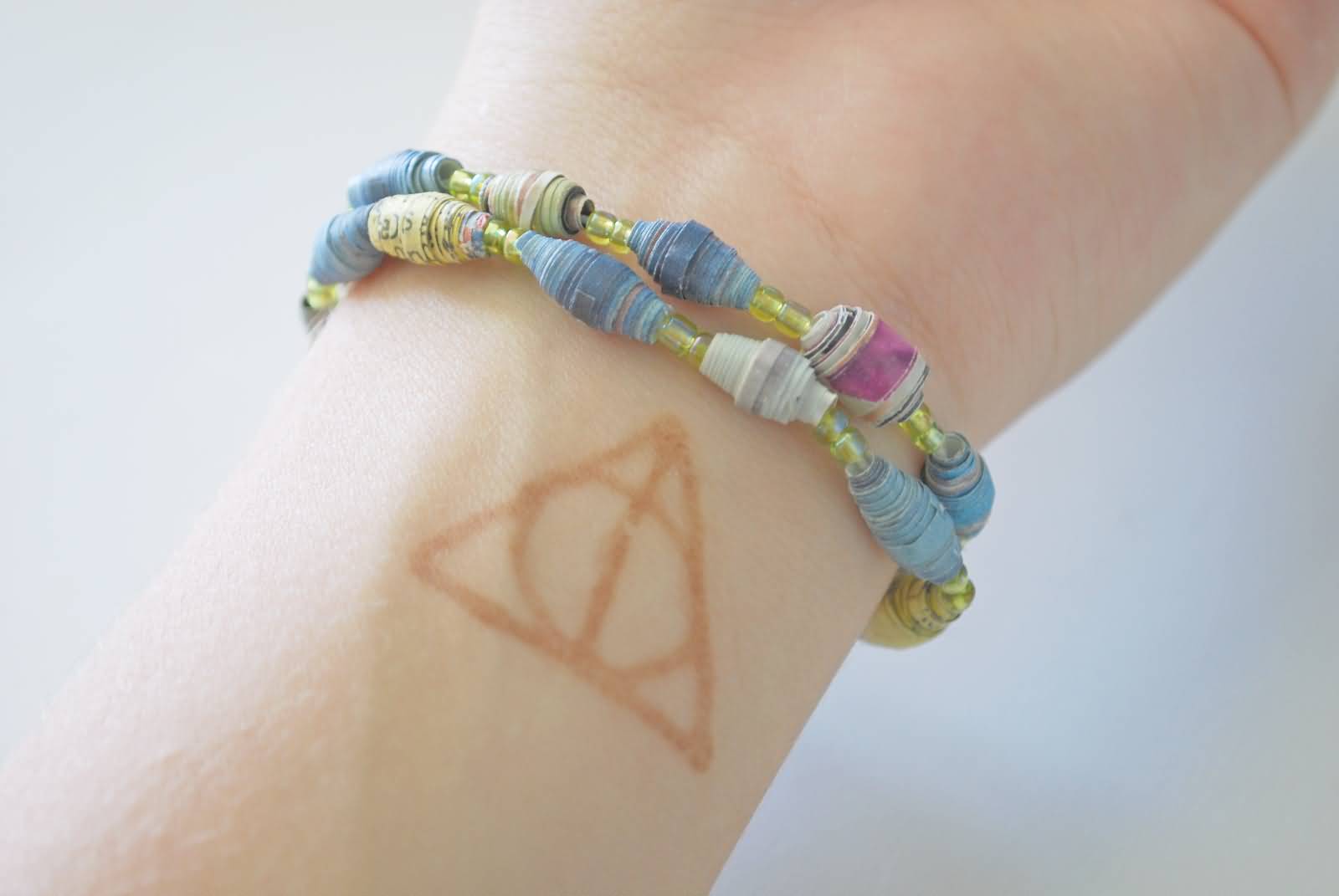 Yellow Deathly Hallows Tattoo By Likegiselle