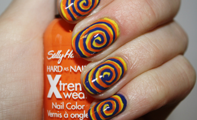 Yellow Purple And Orange Color Spiral Nail Art