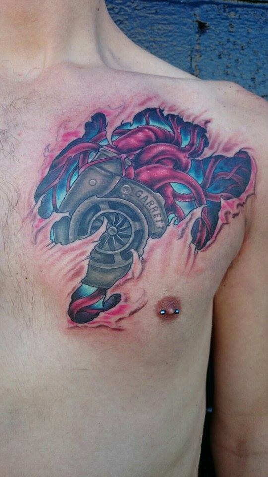 3D Turbo Charger Heart Tattoo On Chest By Rob Zeinog