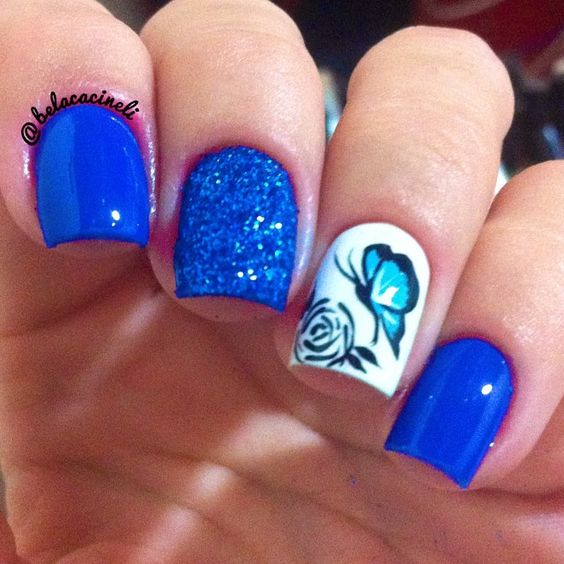 Accent Blue Butterfly Nail Art On White Nails