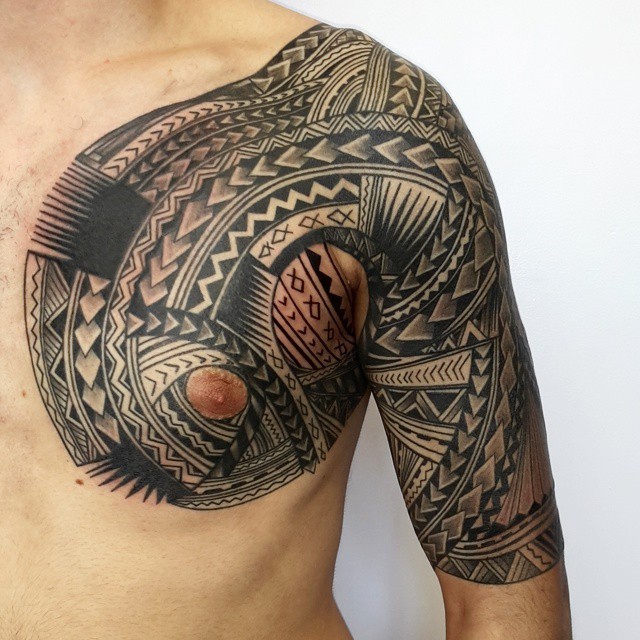 Amazing Samoan Tribal Tattoo On Left Half Sleeve And Chest