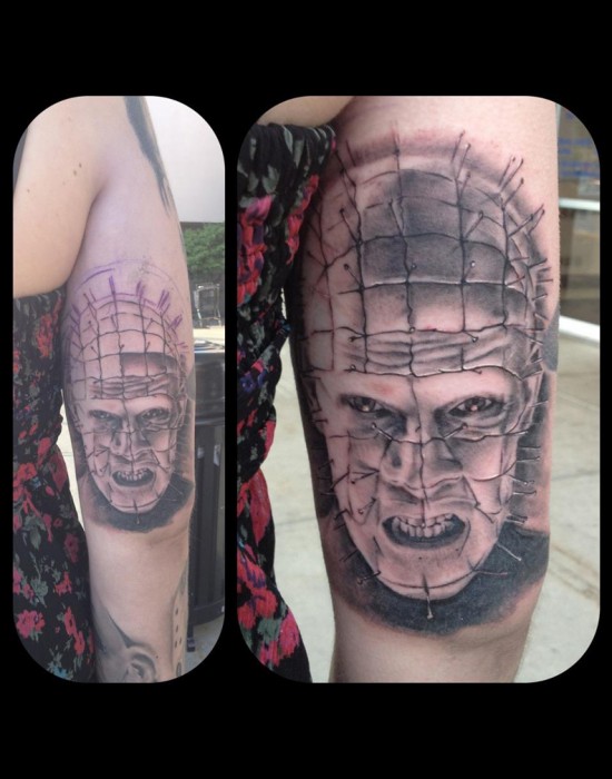 Angry Black And Grey Pinhead Tattoo On Triceps