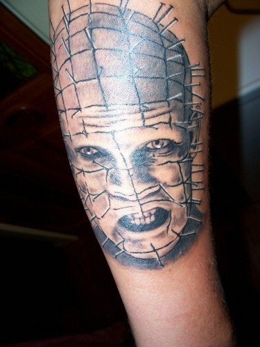 Angry Pinhead Face Tattoo