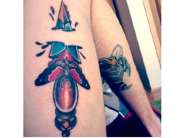 Attractive Dagger Ripped Skin Tattoo