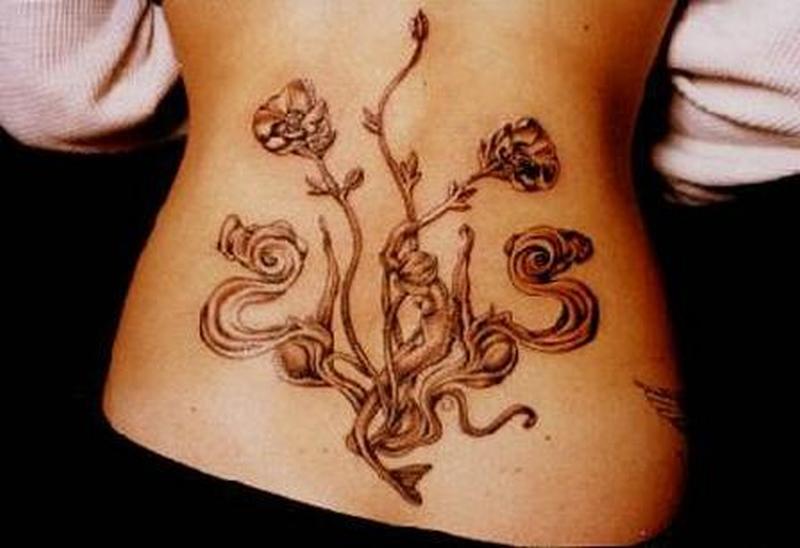 Attractive Flower Vine Plant Tattoo On Lower Back