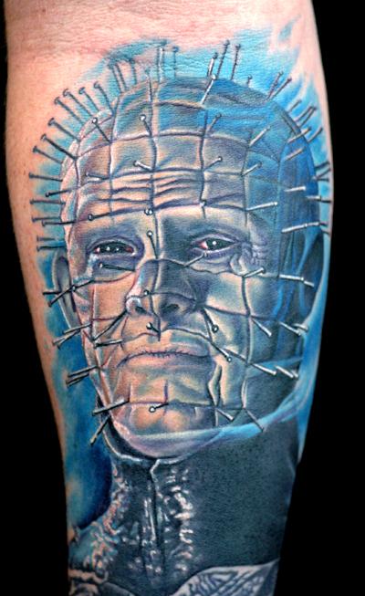 Attractive Pinhead Portrait Tattoo On Forearm