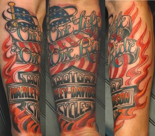 Awesome Flaming Harley Davidson And American Flag Tattoo On Forearm