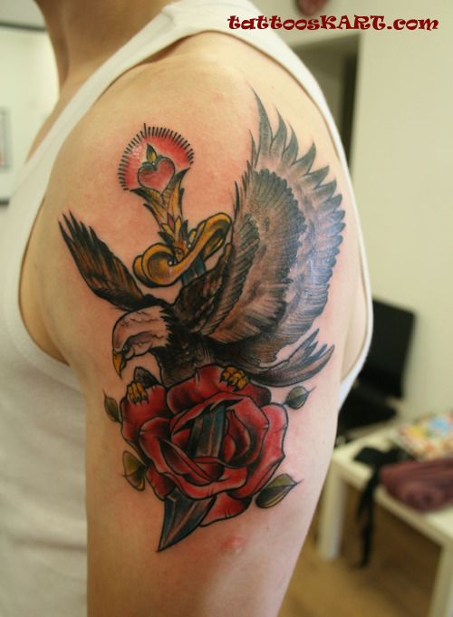 Awesome Flying Eagle And Knife With Rose Tattoo On Left Shoulder