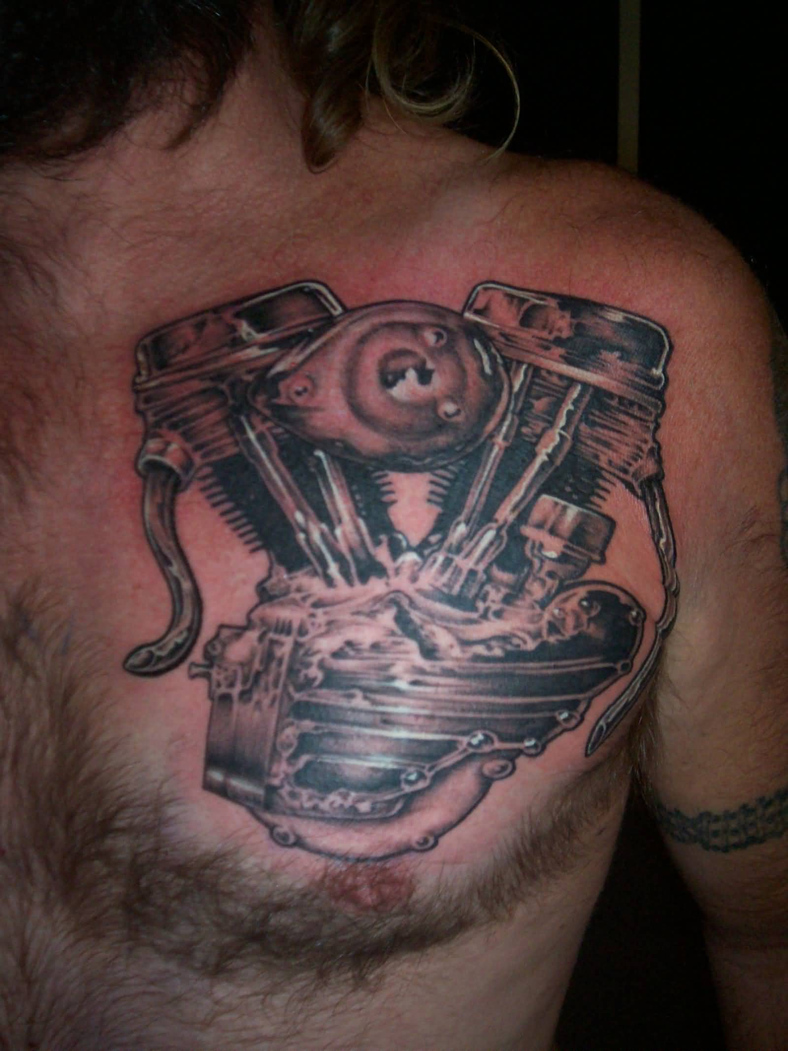 Awesome Grey Ink Harley Davidson Engine Tattoo On Chest