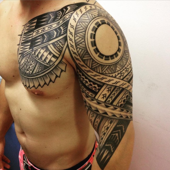Awesome Samoan Tattoo On Left Half Sleeve And Chest