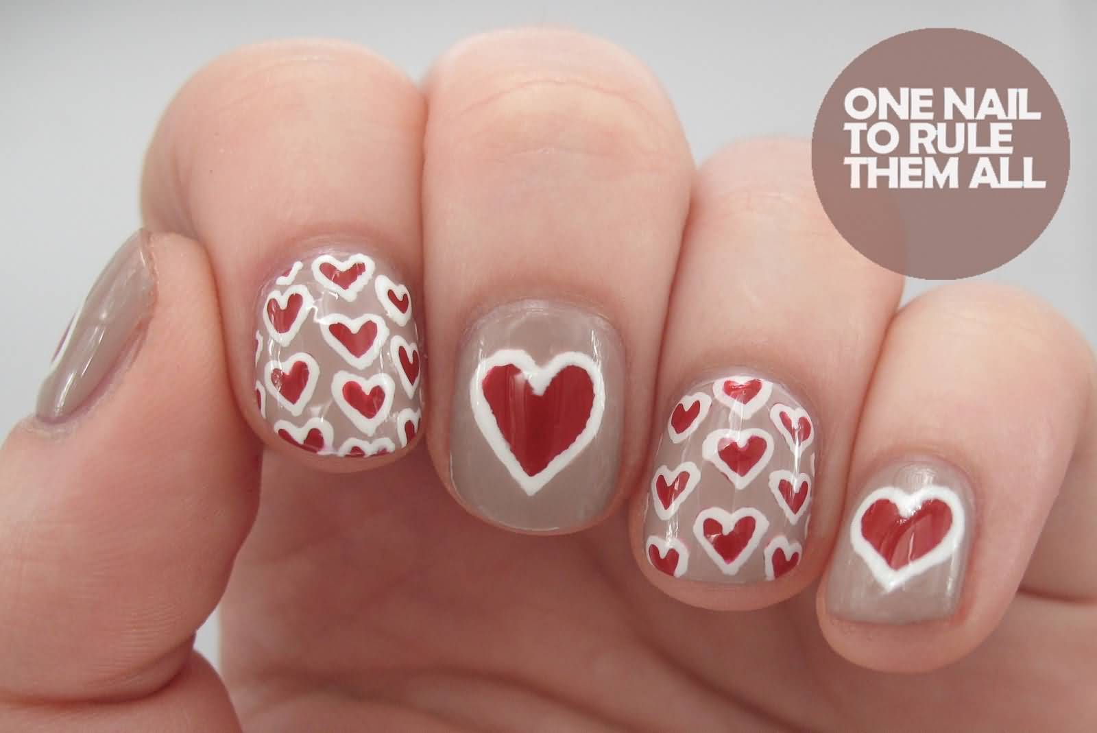 white and pink nail design with red heart