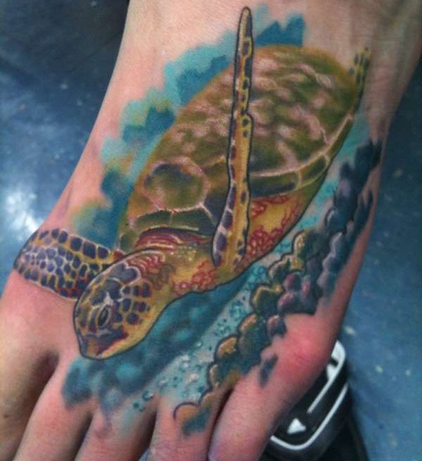Beautiful Swimming Sea Turtle Color Tattoo On Foot