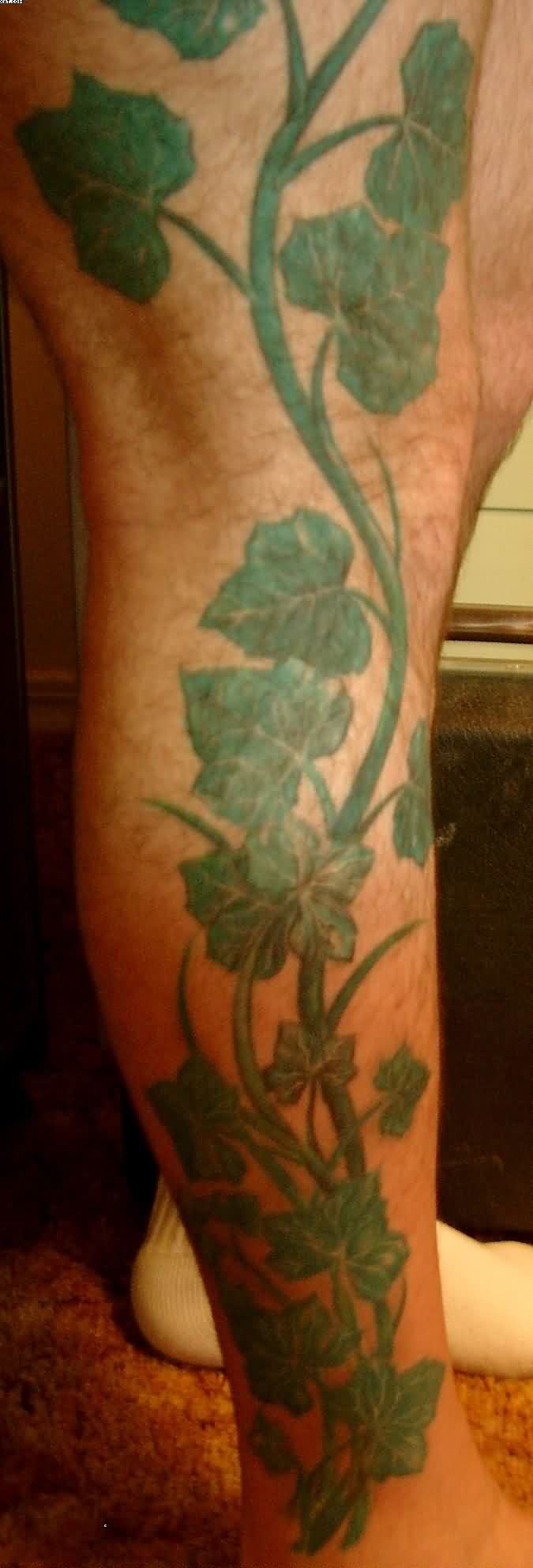 Big Green Plant Tattoo On Leg
