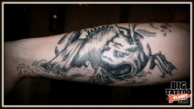 Black And Grey Sea Creature Monster Tattoo On Forearm