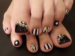 Black And White Stripes With Golden Studs Design Nail Art Idea