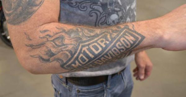 Black Flaming Harley Logo Tattoo On Right Arm Sleeve