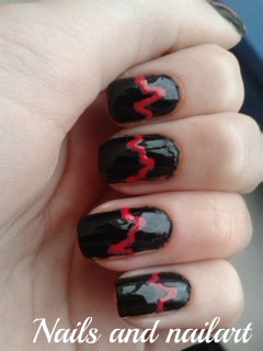 Black Glossy Nails With Red Acrylic Heartbeat Nail Art