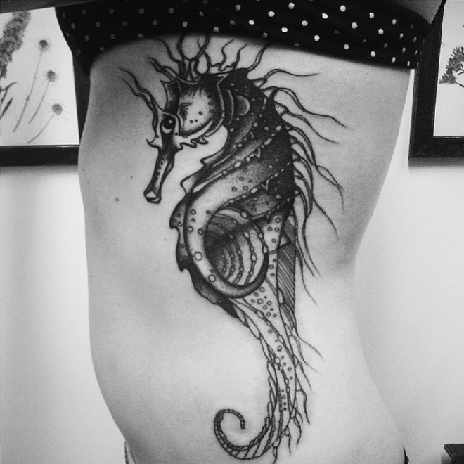Black Ink Seahorse Tattoo On Side Rib