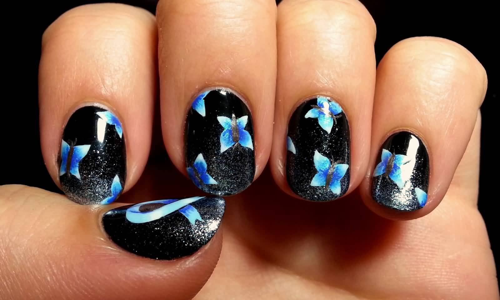 Black Nails With Blue Butterflies Nail Art