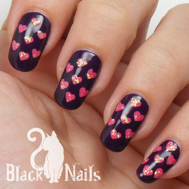 Black Nails With Pink Hearts Nail Art Idea