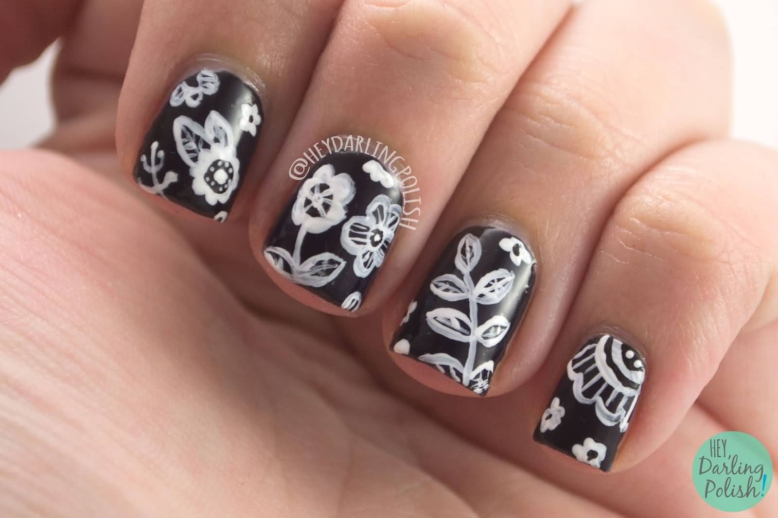 Black Nails With White Flowers Nail Art
