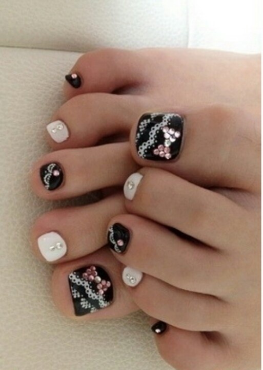 Black Toe Nails With White Lace Design And Rhinestones Bow Nail Art