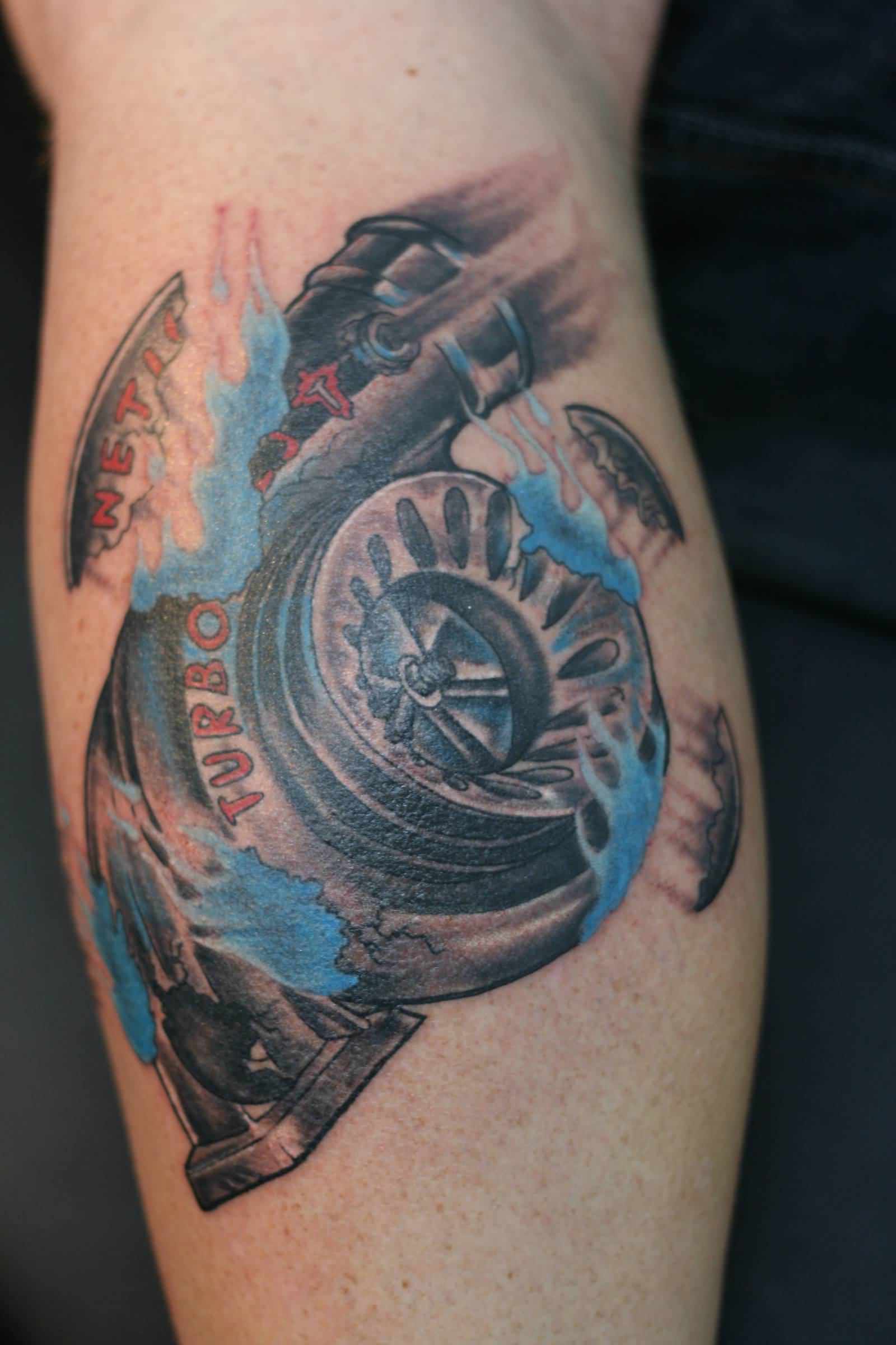 Blue And Grey Ink Turbo Charger Tattoo On Biceps