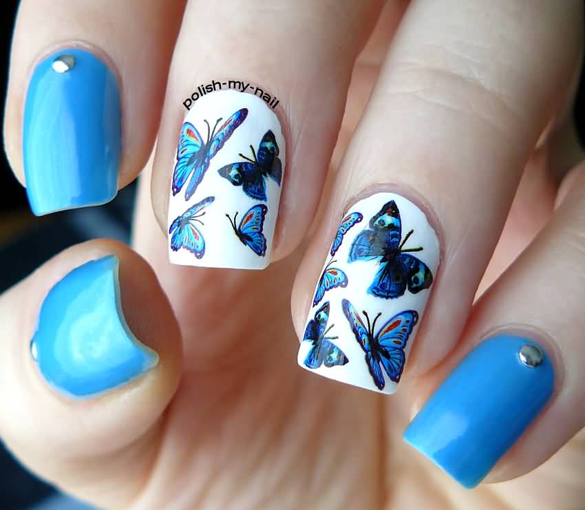 Blue Butterflies Nail Art On White Nails