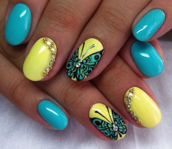 Blue Butterflies Nail Design On Yellow Nails With Rhinestones Design