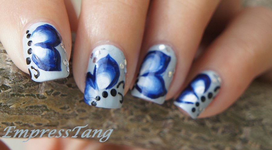 Blue Butterfly Wings Nail Art