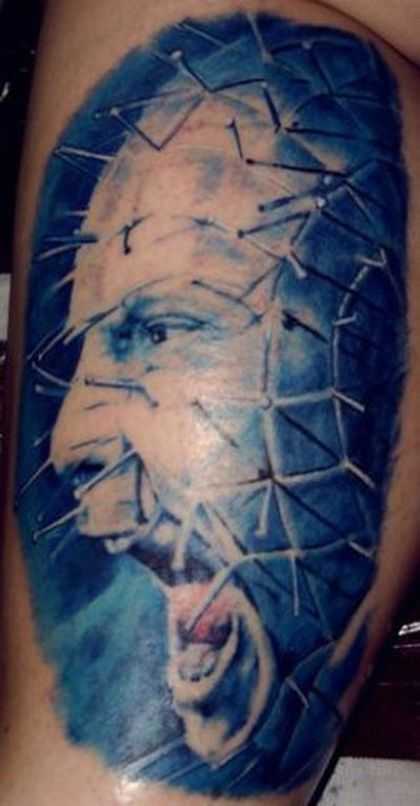 Blue Ink Shouting Pinhead Tattoo