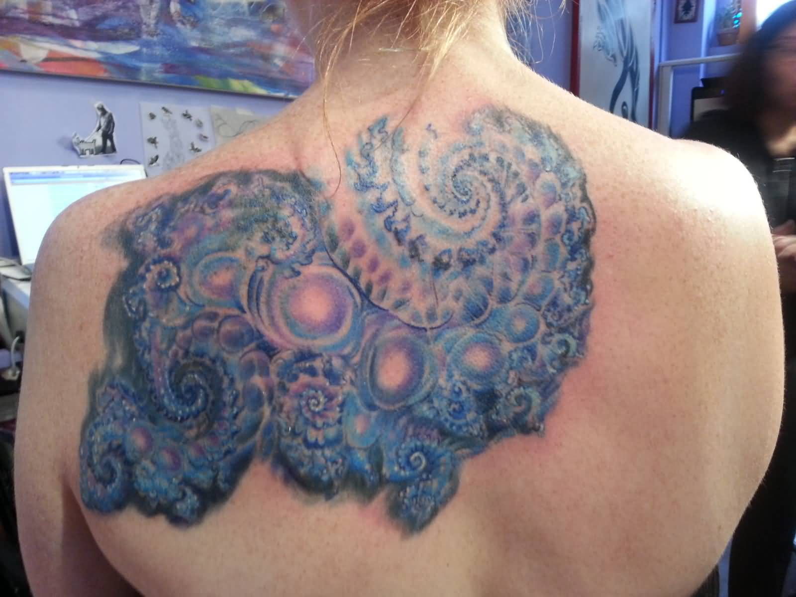 Blue Purple Psychedelic Fractal Mandelbrot Tattoo On Upper Back