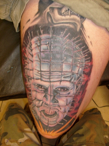 Colored Angry Pinhead Face Tattoo