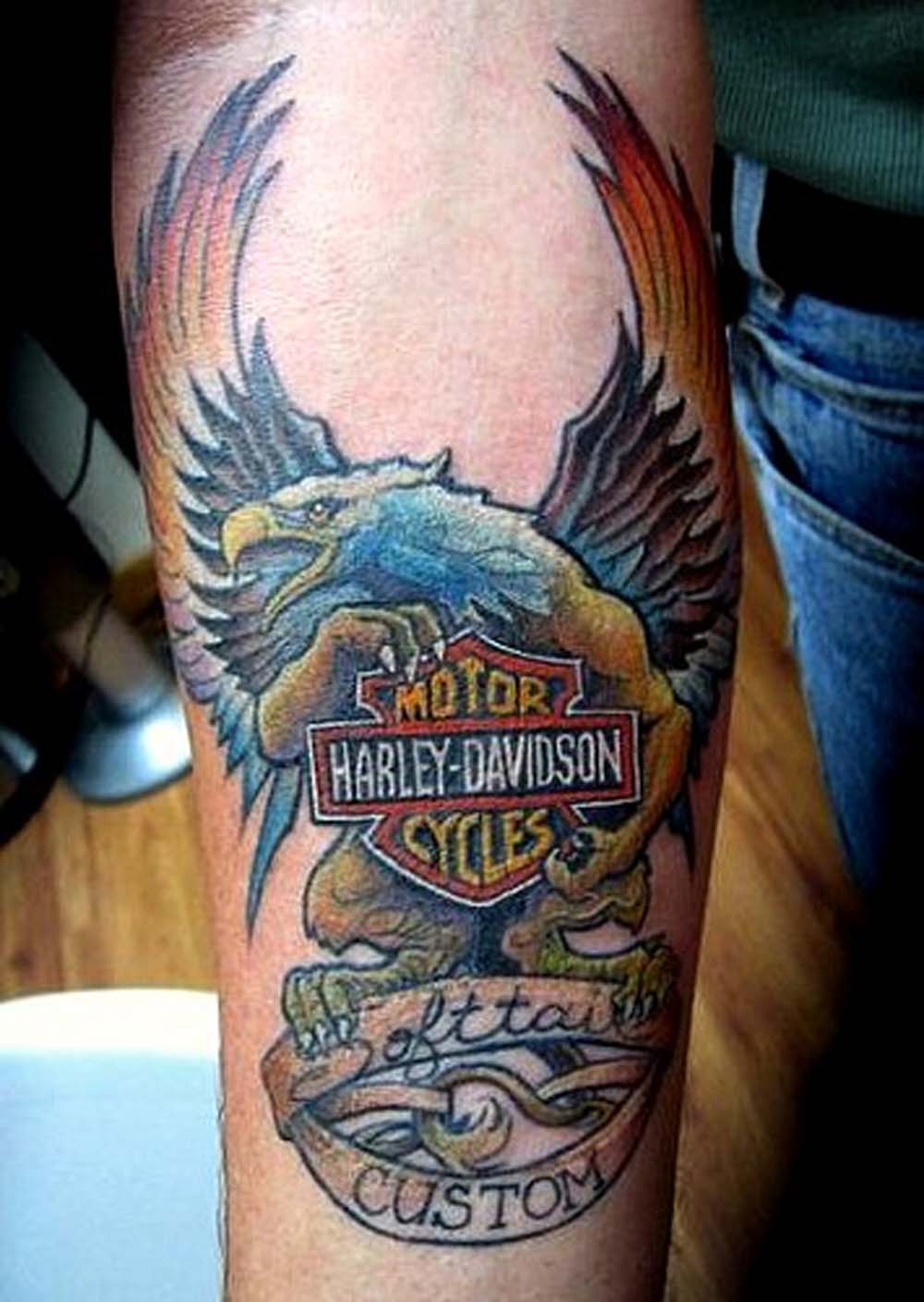 Colorful Eagle And Harley Bike Logo Tattoo On Forearm