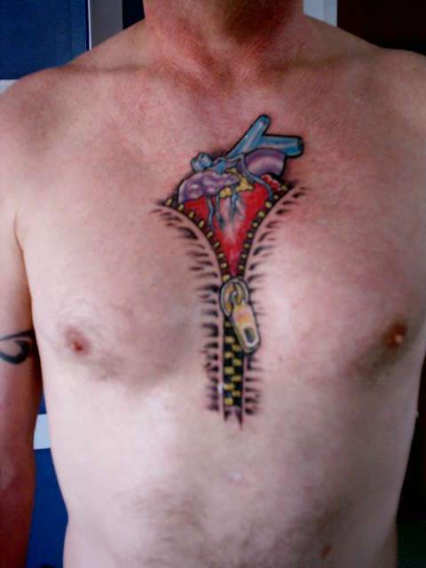 Colorful Heart Zipper Tattoo On Chest