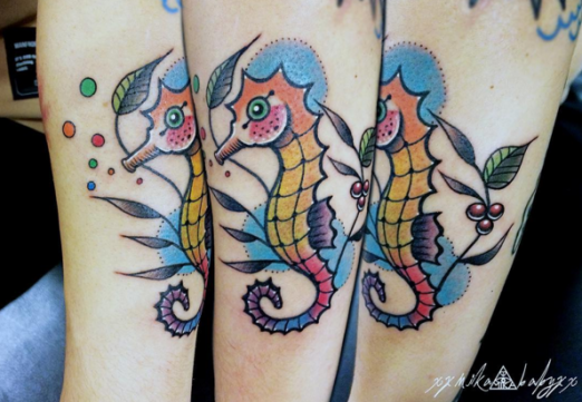 Colorful Seahorse With Leaves Tattoo