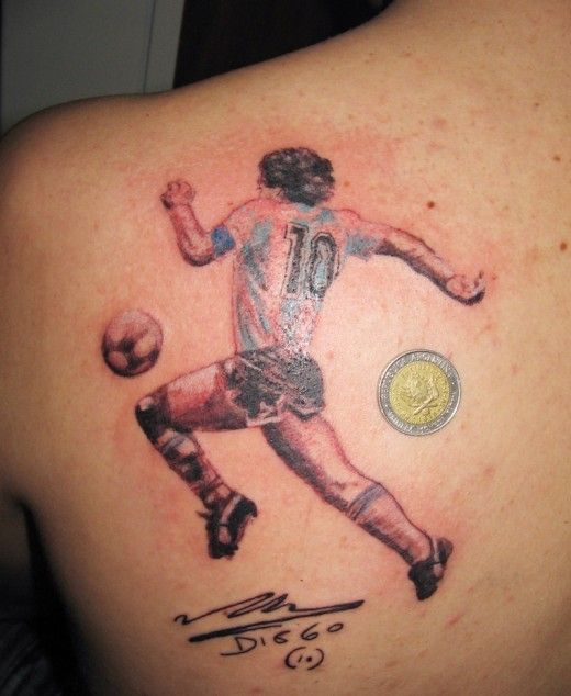 Cool Player Playing Soccer Tattoo On Left Back Shoulder