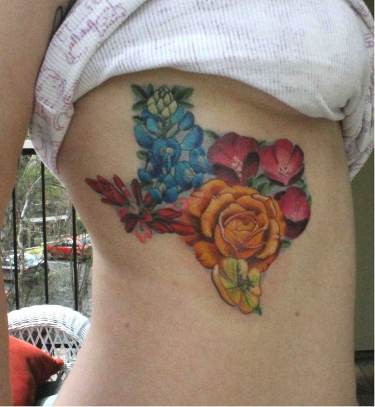 Creative Beautiful Flowers In The Shape Of Texas Tattoo On Side Rib