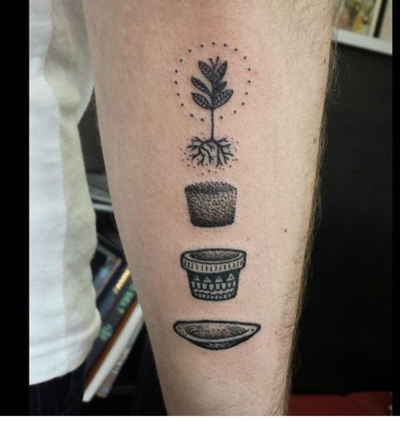 Creative Plant And Pot Tattoo On Arm