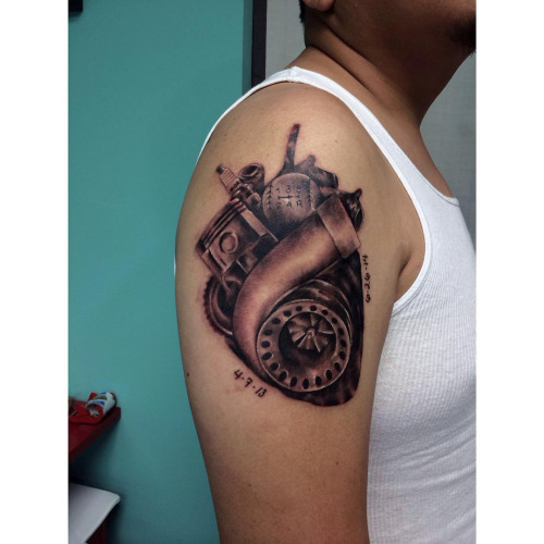 Creative Turbo And Other Parts Making Heart Tattoo On Right Shoulder