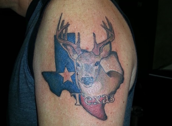 Deer With Texas Flag On Map Tattoo On Left Shoulder
